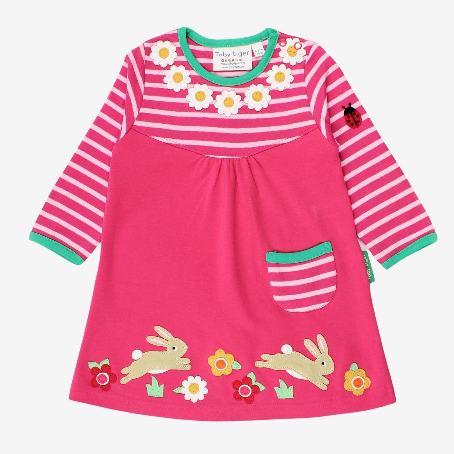 Pink dress with floral and animal appliqués on a white background