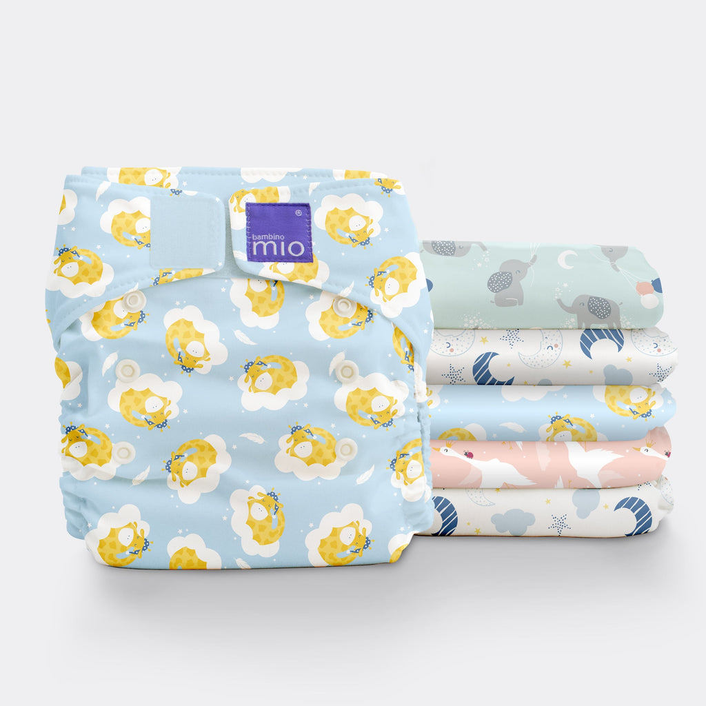 Floral-patterned baby blanket with 'mio' branding on a white background
