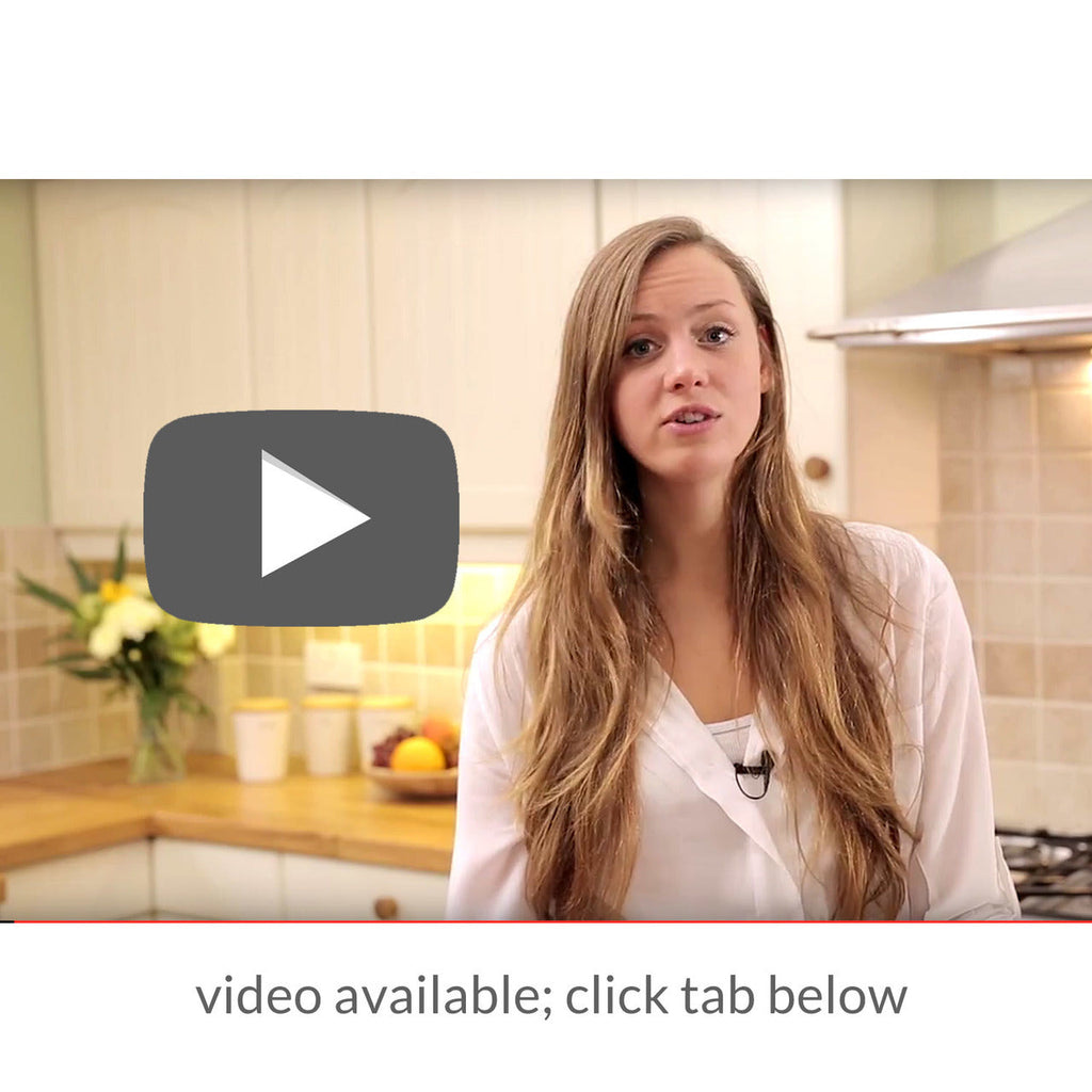Woman in a kitchen with a play button overlay