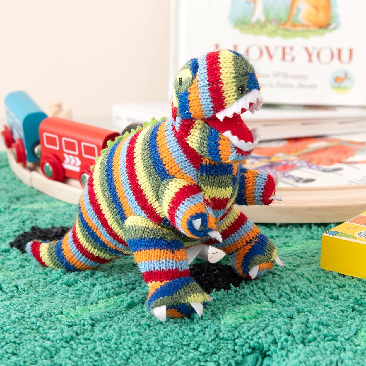 Best Years - Knitted T - Rex Dinosaur Baby Rattle - Rainbow Stripe - Baby&More