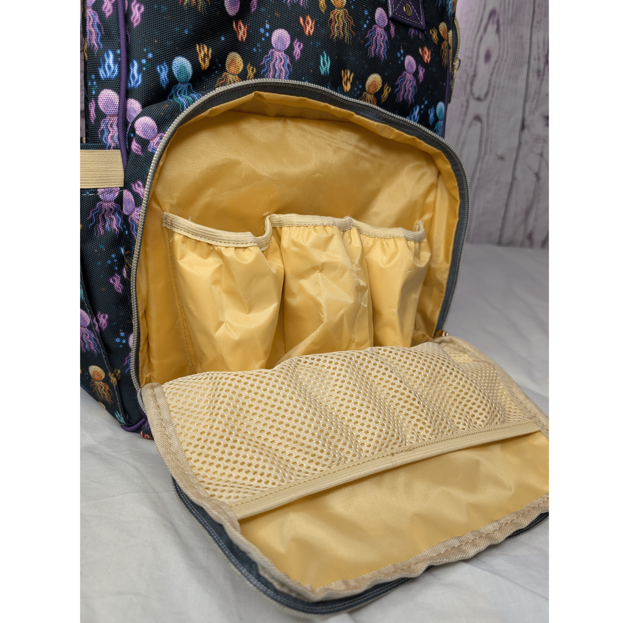 Green Cheeks Baby Changing Backpack - Squidding Around