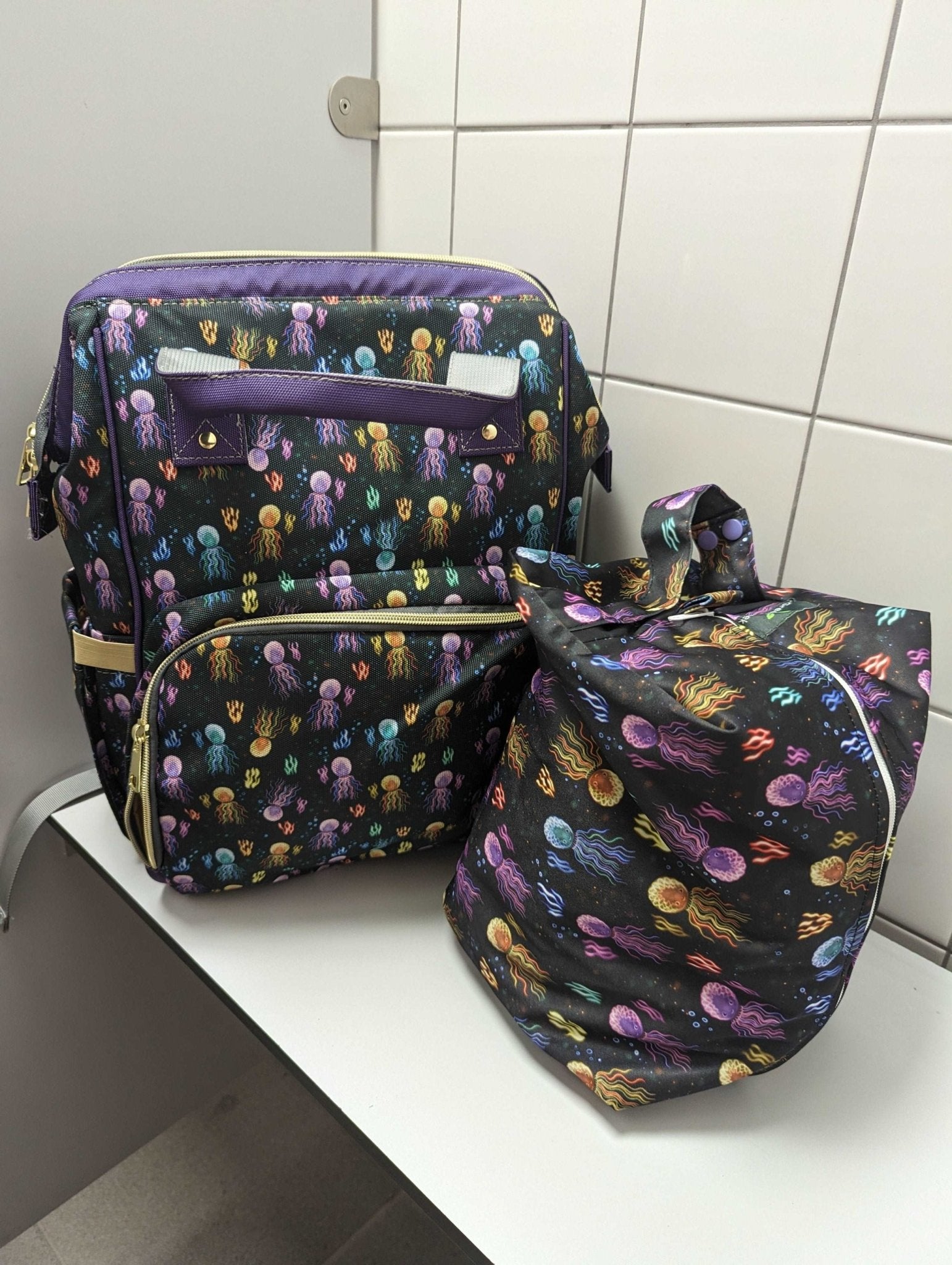 Green Cheeks Baby Changing Backpack - Squidding Around