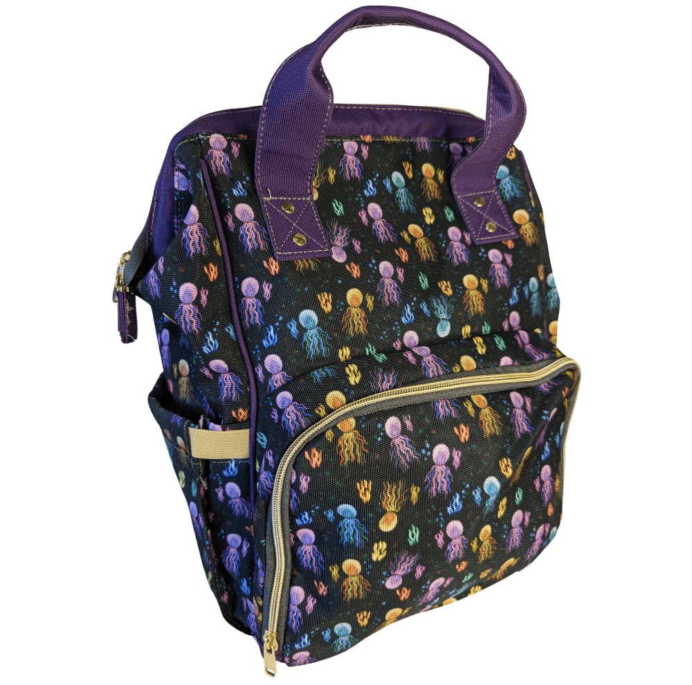 Green Cheeks Baby Changing Backpack - Squidding Around - Baby&More