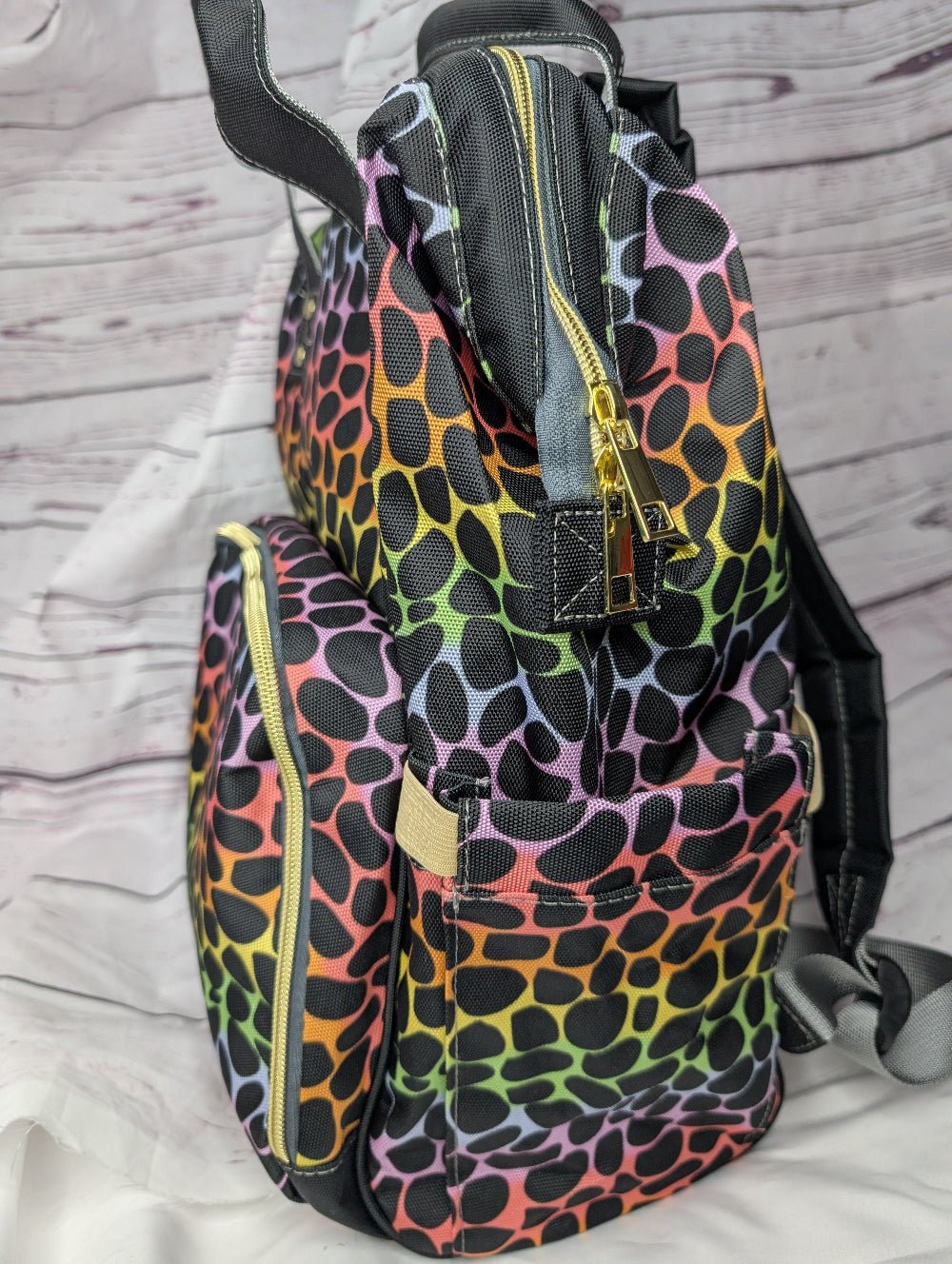 Green Cheeks Baby Changing Backpack - Rainbow Leopard Print