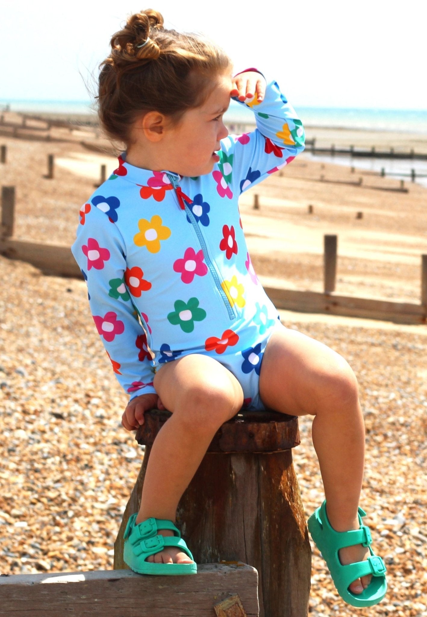 Long-Sleeved Kids' Swimsuit - Rainbow Bloom Print