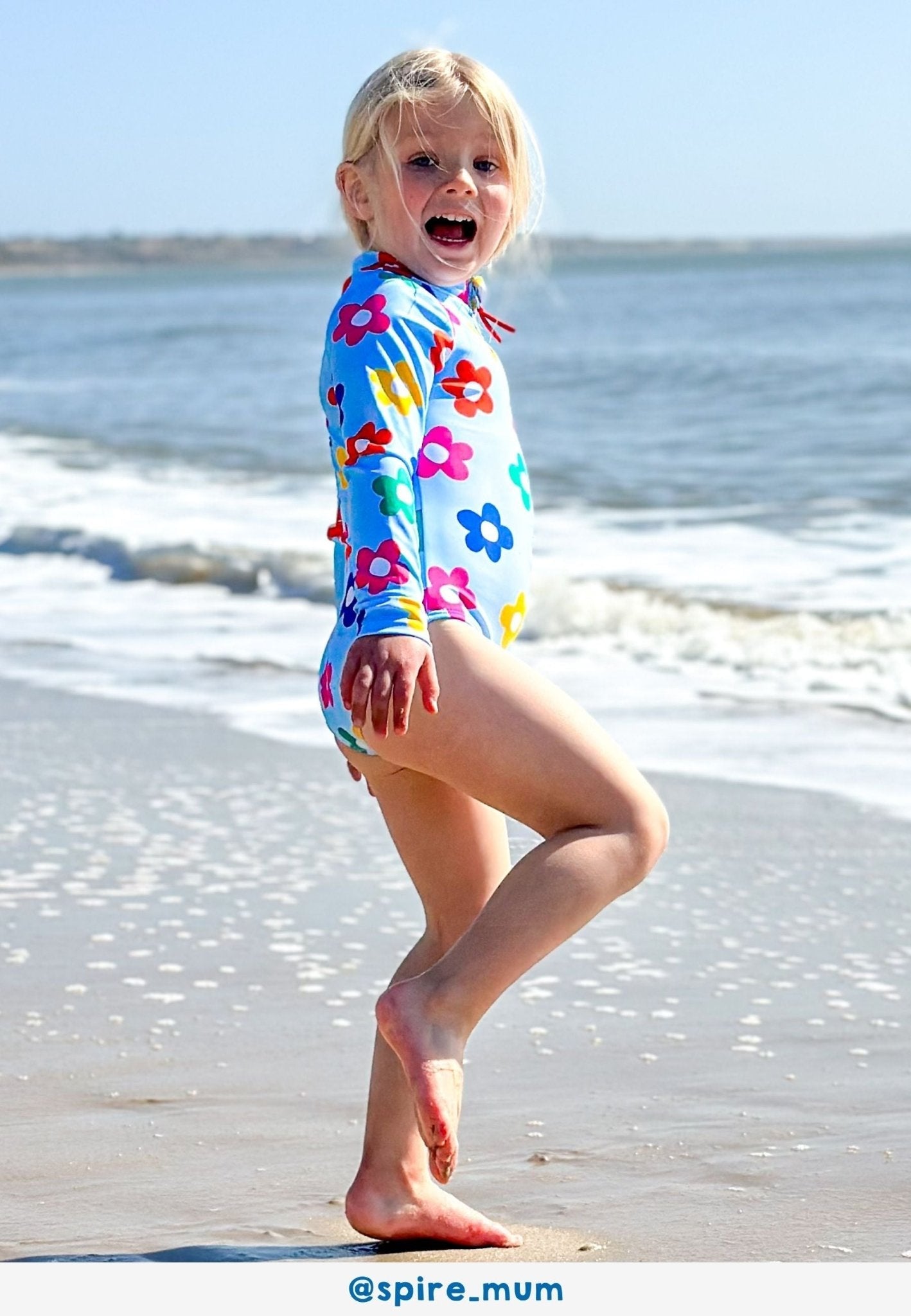 Long-Sleeved Kids' Swimsuit - Rainbow Bloom Print