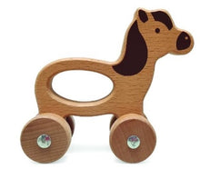 Animales de madera sobre ruedas, jirafa, caballo, elefante 